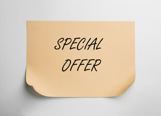 Sheet of paper with phrase Special Offer on white background, top view