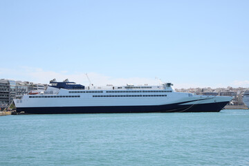 Fototapeta na wymiar Modern ferry in sea port on sunny day