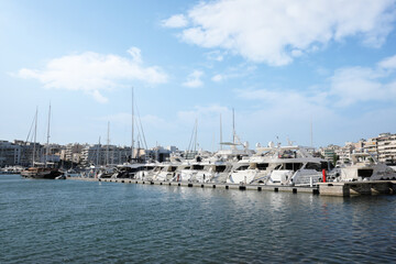 Fototapeta premium Picturesque view of port with modern boats on sunny day