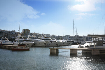 Picturesque view of port with modern boats on sunny day