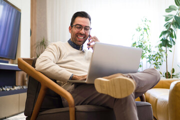 Young man working at home