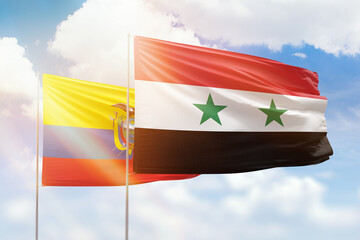 Sunny blue sky and flags of syria and ecuador