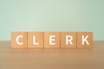 事務員・店員のイメージ｜「CLERK」と書かれたブロック