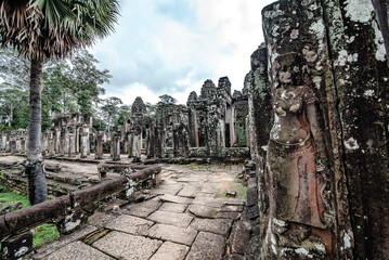 Sandstone slab walkways surround Bayon Temple in Angkor Thom, Siem Reap, Cambodia.
