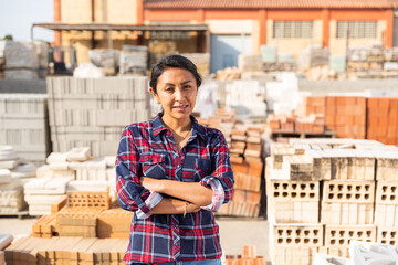 Portrait of a woman seller of building materials at an open-air site