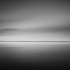 Moody long exposure view of lake Saroma in winter, Hokkaido, Japan