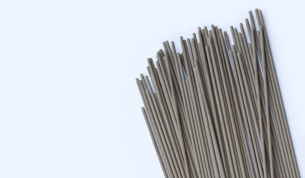 Welding electrodes wire on white background.