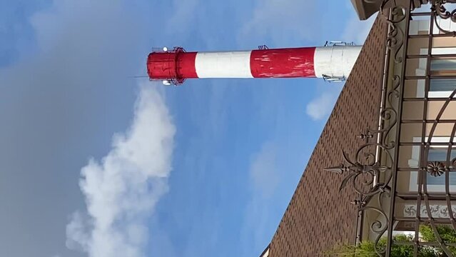 environmental problems. smoke from the chimney against the blue sky