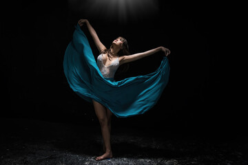 young ballerina with a perfect body is dancing in a photo studio, dancers are dressed in fashionable outfits, this picture is taken in minimal style, showing the beauty of classical art like ballet. - obrazy, fototapety, plakaty