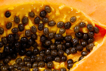 Close up of of ripe papaya. View of the Inside of a Papaya. Sweet tropical fruit. Using as tropical fruits concept.