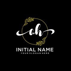 AH Initial handwriting logo vector. Hand lettering for designs.