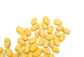 Fava bean, roasted and salty on white background