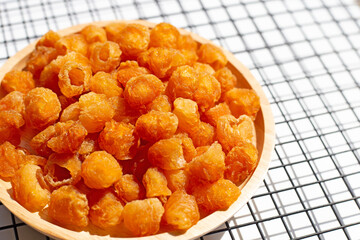 Dried longan on white background.