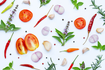 Cooking ingredients, Various fresh vegetables and herbs on white background.