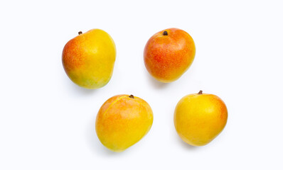 Fototapeta na wymiar Mango, Tropical fruit on white background. Top view