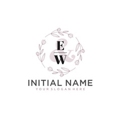 Initial letter EW beauty handwriting logo vector