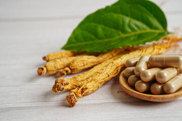 Ginseng roots and green leaf, healthy food.