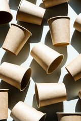 Some disposable paper coffee cup. Mock up to go coffee cups with shadow, top view.