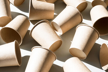 Some disposable paper coffee cup. Mock up to go coffee cups with shadow, top view.