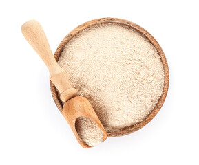 Bowl of buckwheat flour with scoop on white background