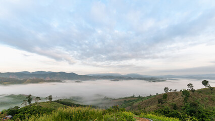 Fototapeta na wymiar misty landscape in the morning surrounded by mountains Sea of ​​mist at Doi Ti Doo Nan, Thailand Nan Thailand tourist attractions , Doi tee doo
