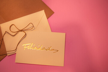 Greeting card mockup with word best wishes on pink background