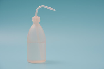 plastic laboratory dispenser with chemical liquid