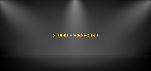 Black studio background with lights