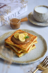 a plate of french toast with jam 