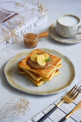 a plate of french toast with jam 