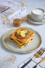 a plate of french toast with jam 