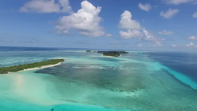 Drone flying near a wild island in the Maldives Full HD