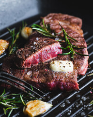 beef steak with rosemary, Rare, selective focus