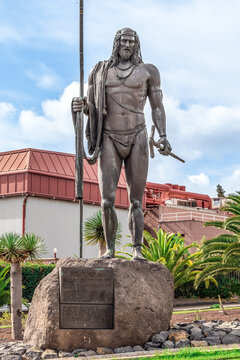 San Cristobal de La Laguna, Spain - November 24,2021: Statue of Mencey Bencomo with a staff and a weapon in La Laguna. Monument to penultimate king of Taoro, a Guanche menceyato on the Tenerife island