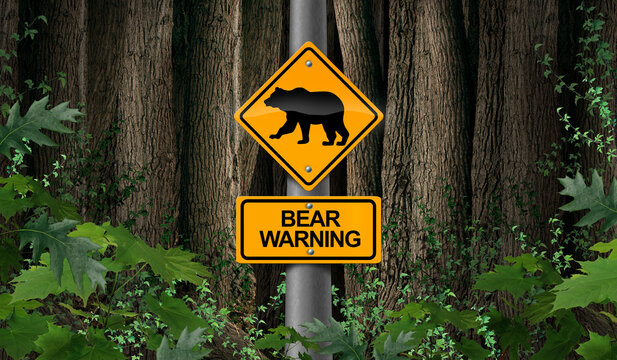 Bear warning in the woods signage or camping danger sign as a scary predator as a risk for Bears in the wild