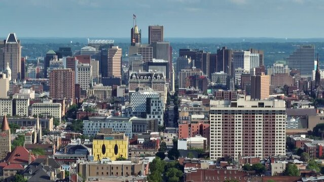 Downtown Baltimore Maryland city skyline. Aerial truck shot with long zoom.