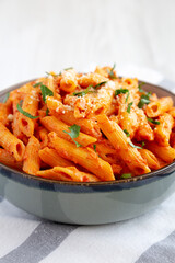 Homemade Penne Alla Vodka from Leftover Sauce with Cheese and Parsley, side view.