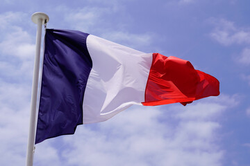 French flag mat of France wave over cloud sky country red blue white colors