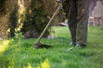 Lawn mover on green grass. Machine for cutting lawns.