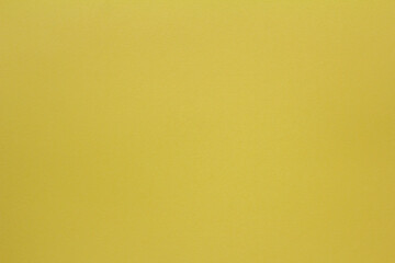 Obraz premium Yellow paper background.The texture of thick yellow paper for creativity.Space for copying.