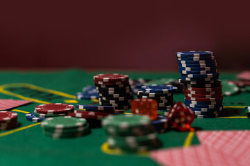 Poker cloth, a deck of cards, poker hand and chips. Background