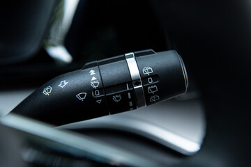 Windscreen wiper control switch in car. Wipers control. 