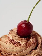 cake basket with cream and cherries on a plate
