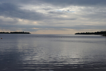 Cloudy sky and river horizon