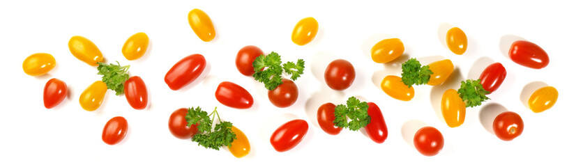 Yellow and red Cherry Tomatoes with Persil Hetbs - Panorama isolated on white Background.