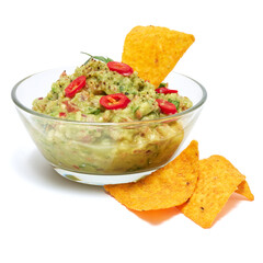 Healthy vegetarian organic guacamole Mexican dip sauce served in glass bowl with nachos or tortilla chips isolated on white background