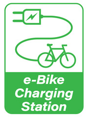 Electric bicycle charging station sign with text and silhouettes of electric plug and e-bike