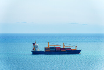 Merchant container ship in the Mediterranean Sea, Gulf of La Spezia, Liguria, Italy, Europe. - obrazy, fototapety, plakaty