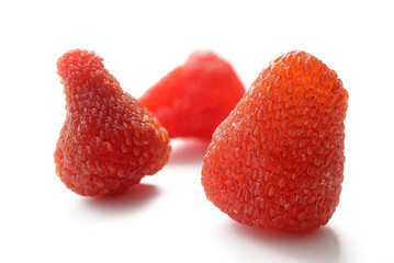 Close up of Dried strawberries on white background. Sweet and sour dried strawberries.