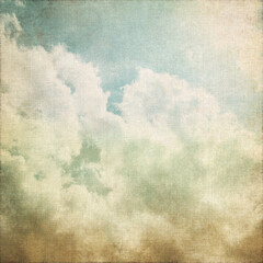 Fototapeta premium vintage background old linen canvas fabric parchment paper texture white clouds on blue sky abstract scenery or landscape aged painting